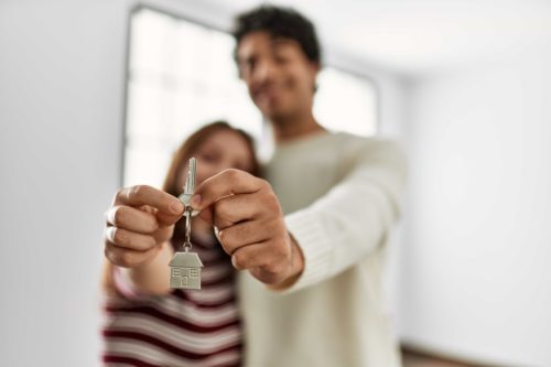 couple with house key